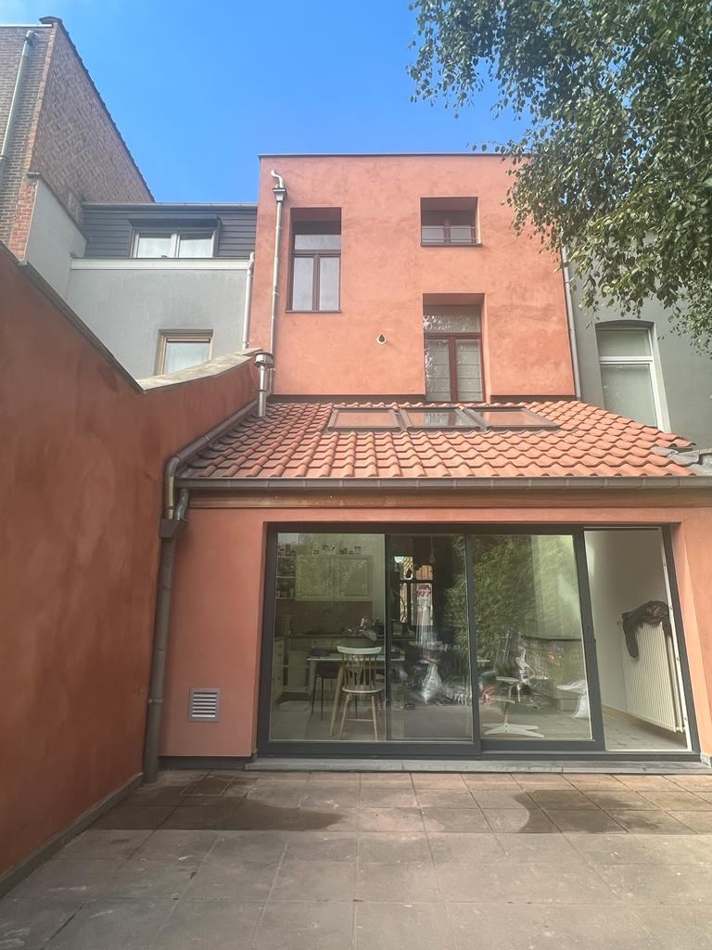 Extension avec baie vitrée et terrasse — H Groupe