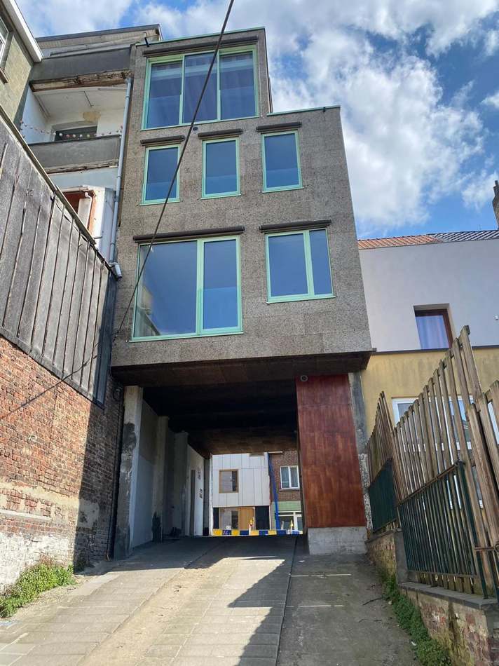 Façade en bardage liège entre mitoyens — H Groupe