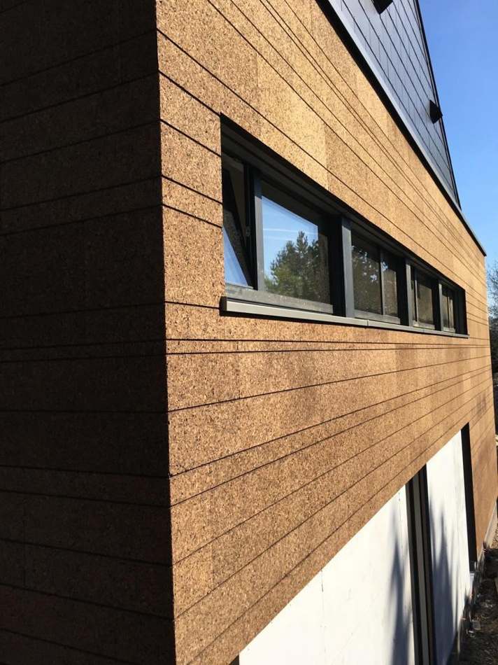 Détail de façade en bardage liège — H Groupe